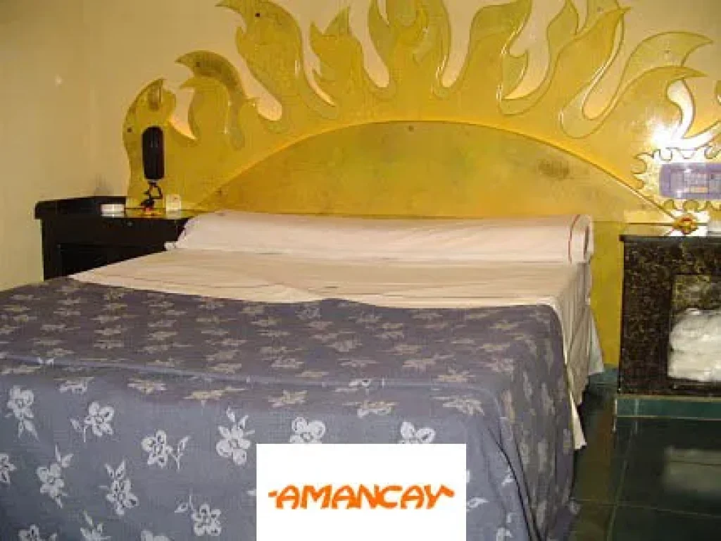 Habitación del hotel Amancay en el barrio de Pamerlo