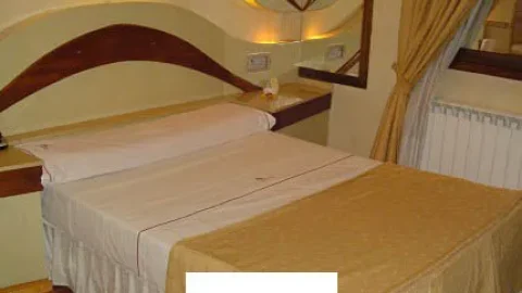 Habitación del hotel Amancay en el barrio de Pamerlo