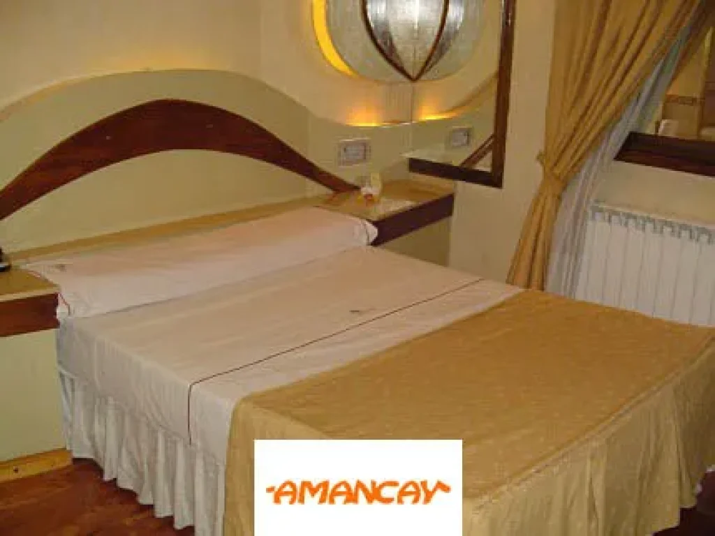 Habitación del hotel Amancay en el barrio de Pamerlo